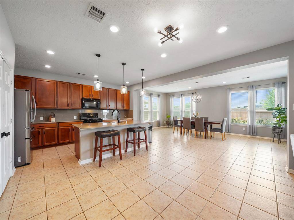 Plenty of space to host friends and family! Lots of cabinet and counter top space.