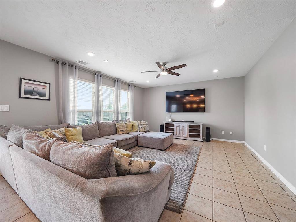 Large Living room! This home is pre wired for surround sound!