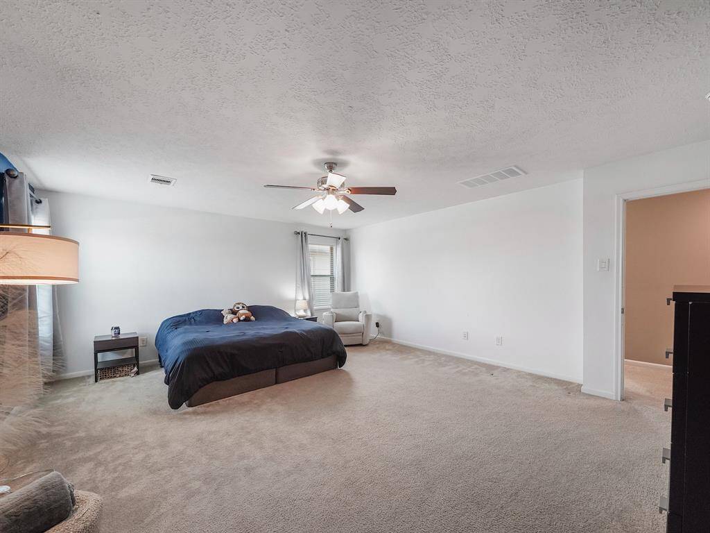 Primary Bedroom! Imagine the possibilities with all of this space.