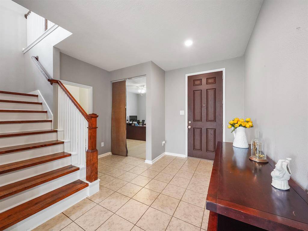 Entry way by the front of the home. Home office located at the front of the home.