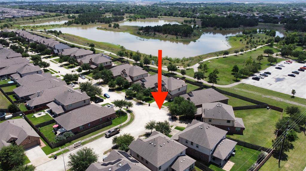 Aerial photo showcasing the home on a non busy street. Minutes from the park which consists of a 1.5 mile trail that leads to Katy Park.
