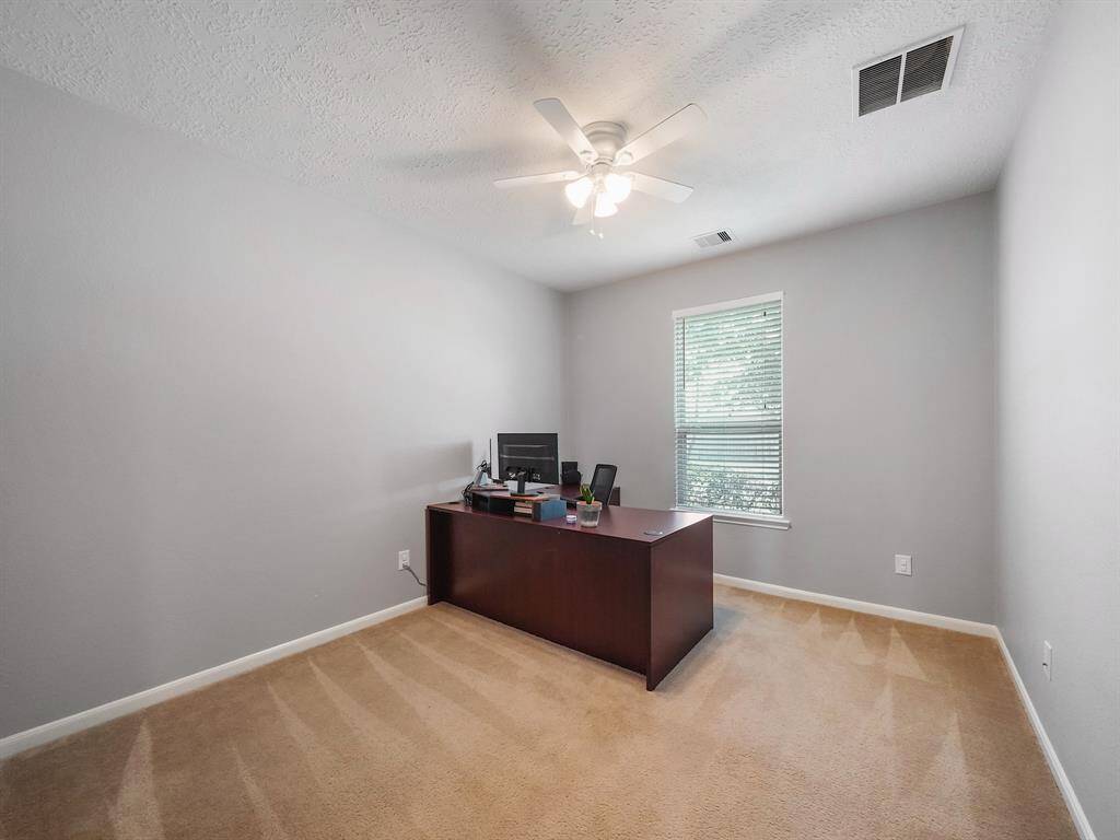 Home Office. Room is located by the front of the home.