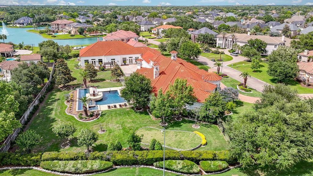 Expansive home with a huge pool including a lap pool, numerous upgrades with very fine details in a prestigious neighborhood.