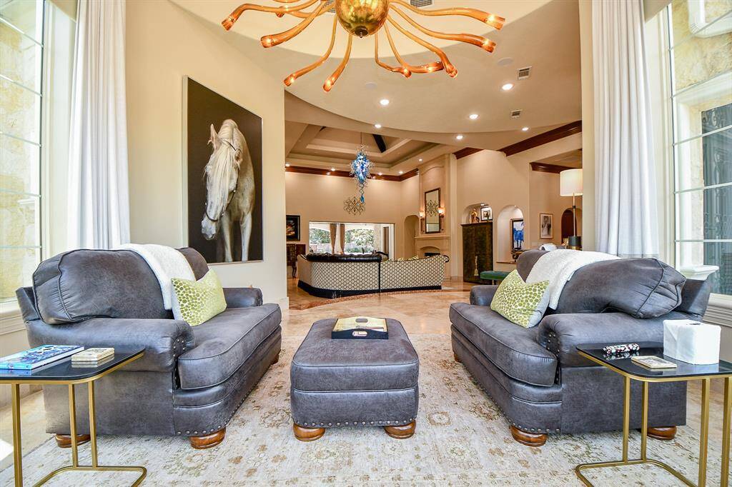 Too many details to list but you will see amazing light fixtures and vaulted ceiling showcasing grand architectural details.