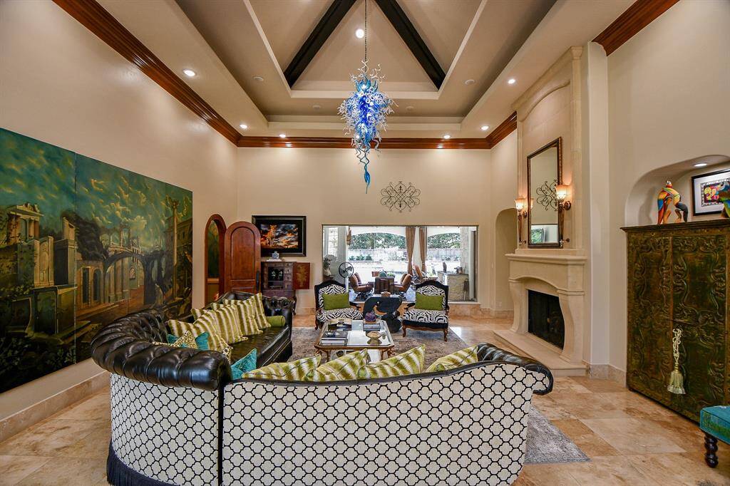 Over looking the pool with waterfalls and outdoor sitting area.