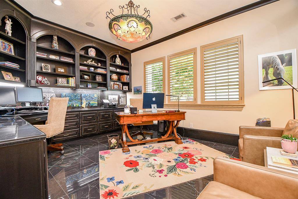 Beautiful study with built ins.