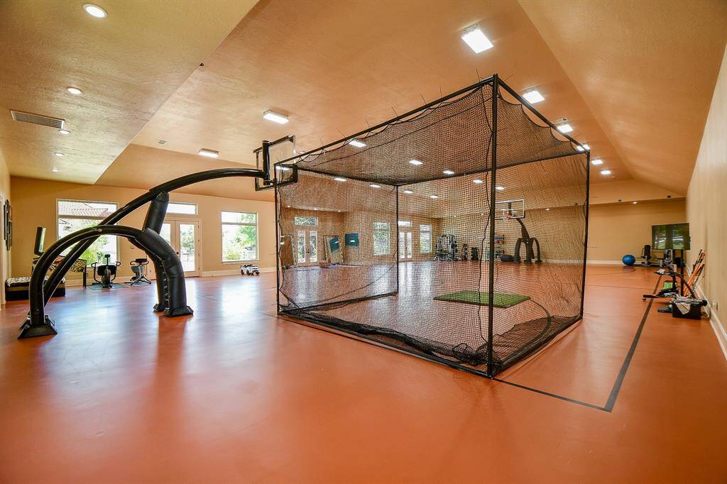 Large sports complex, basket ball court, batting cage, can be a pickle ball court.  Many possibilities await you.