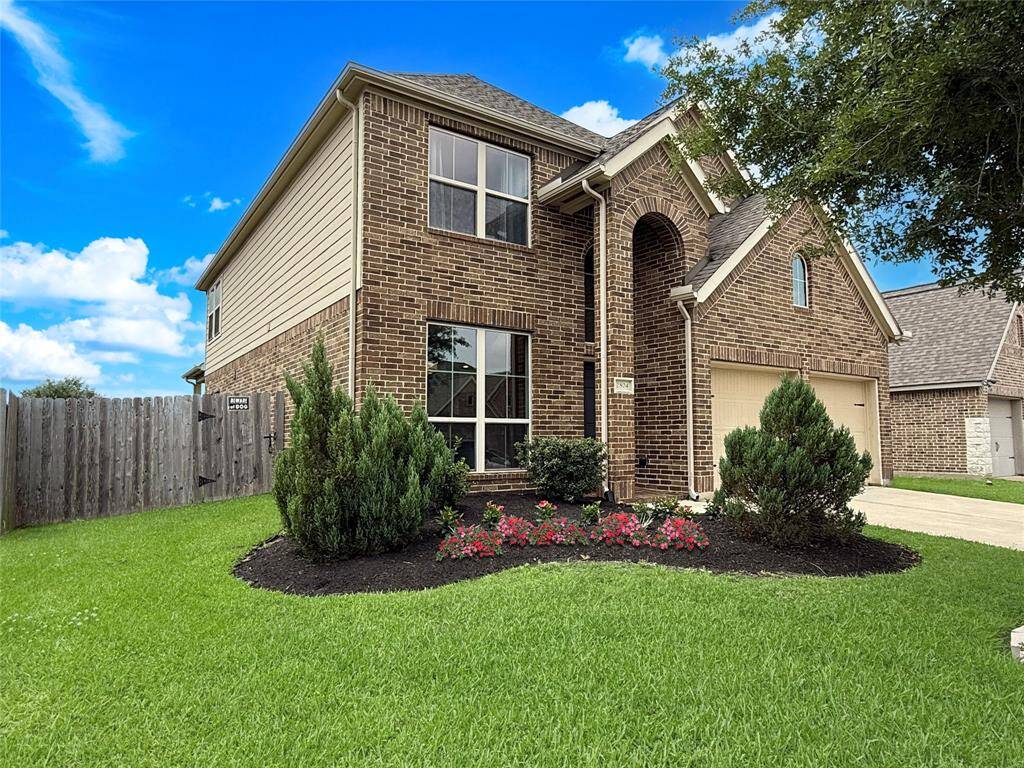 Your home features impeccable landscaping in your front yard where you are greeted every morning with luscious green grass and cheerful flowers. Beautiful brick exterior adorns your new home.
