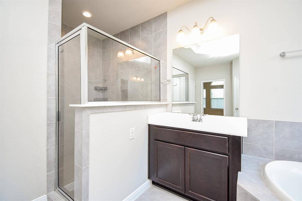 Separate walk in shower and soaking tub