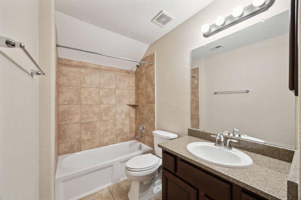 Spacious upstairs game room/flex space has a full bath adjacent to it!