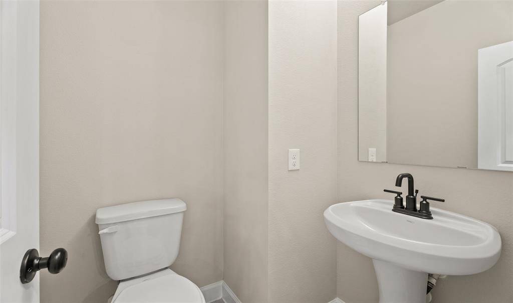 Half bath (*Photo not of actual home and used for illustration purposes only.)
