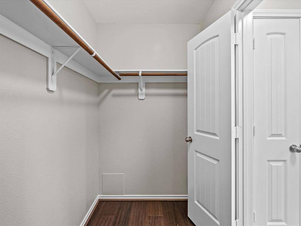 A large walk-in closet just off the primary bath offers plenty of storage , plus a convenient linen closet to keep essentials close at hand.