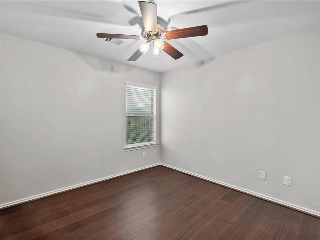 The third bedroom also features bamboo flooring and its own walk-in closet - comfortable, stylish, and functional!