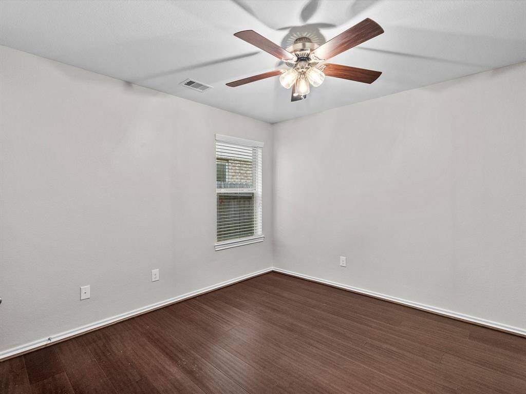 Bright and welcoming, the fourth bedroom adds extra space for family, hobbies, or a quiet retreat of your own!