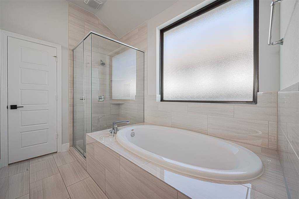 Separate soaker tub and walk in shower