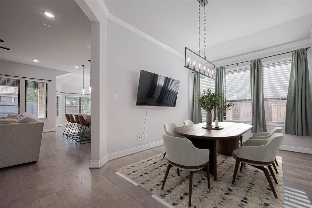 Formal Dining thats open to the living room perfect for entertaining