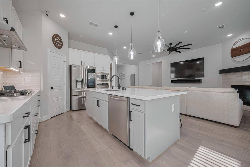 Ample storage and counter space, pendant lighting
