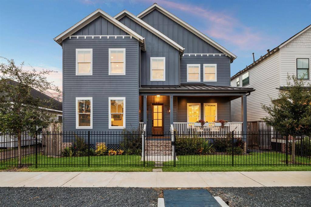 Built in 2022, 319 E 26th is the epitome of classic Heights craftsman style