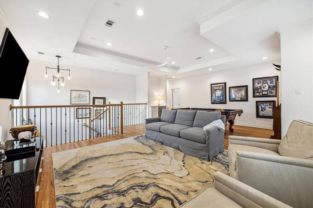 Large game room with dry bar and separate space for pool table