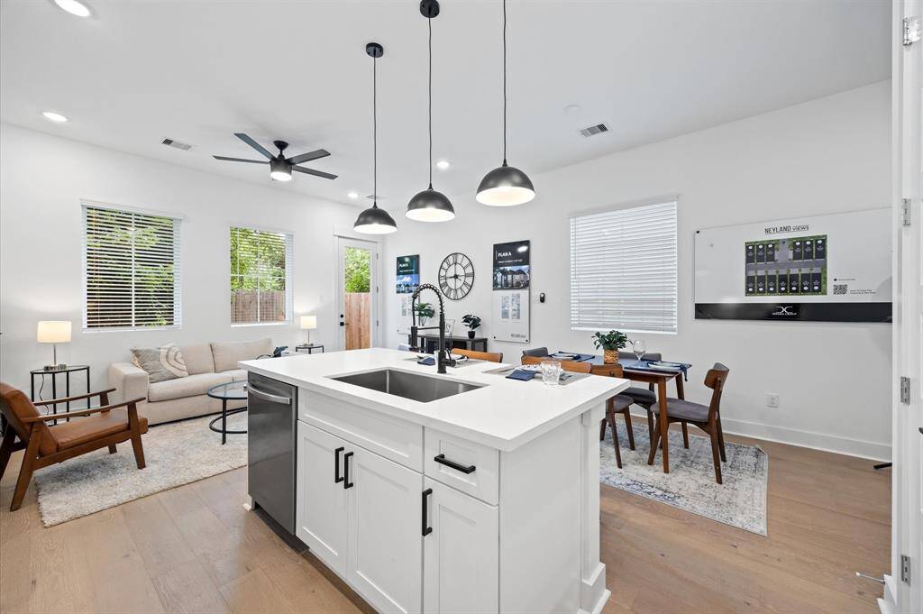 Beautiful kitchen island with plenty of space for food prep and extra sitting area.