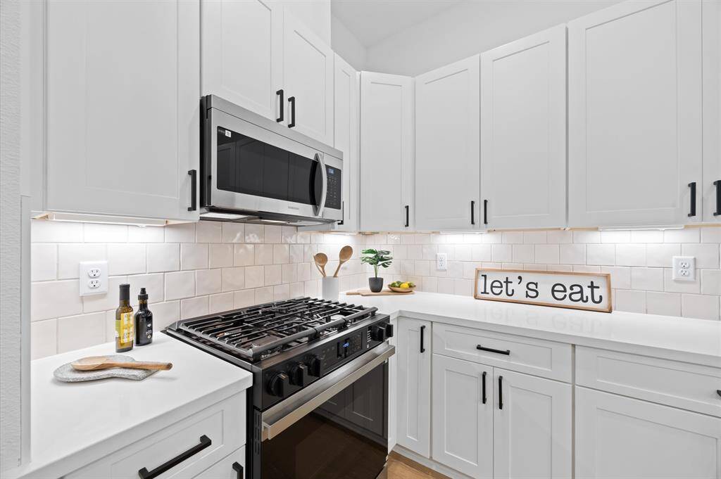 This attractive Kitchen is full of beautiful details. Quartz Countertops, Stainless steel Sink, Stainless Steel Appliances, Recessed Lighting, Undercabinet Lighting, Elegant Cabinetry with Soft Close Drawers and Doors