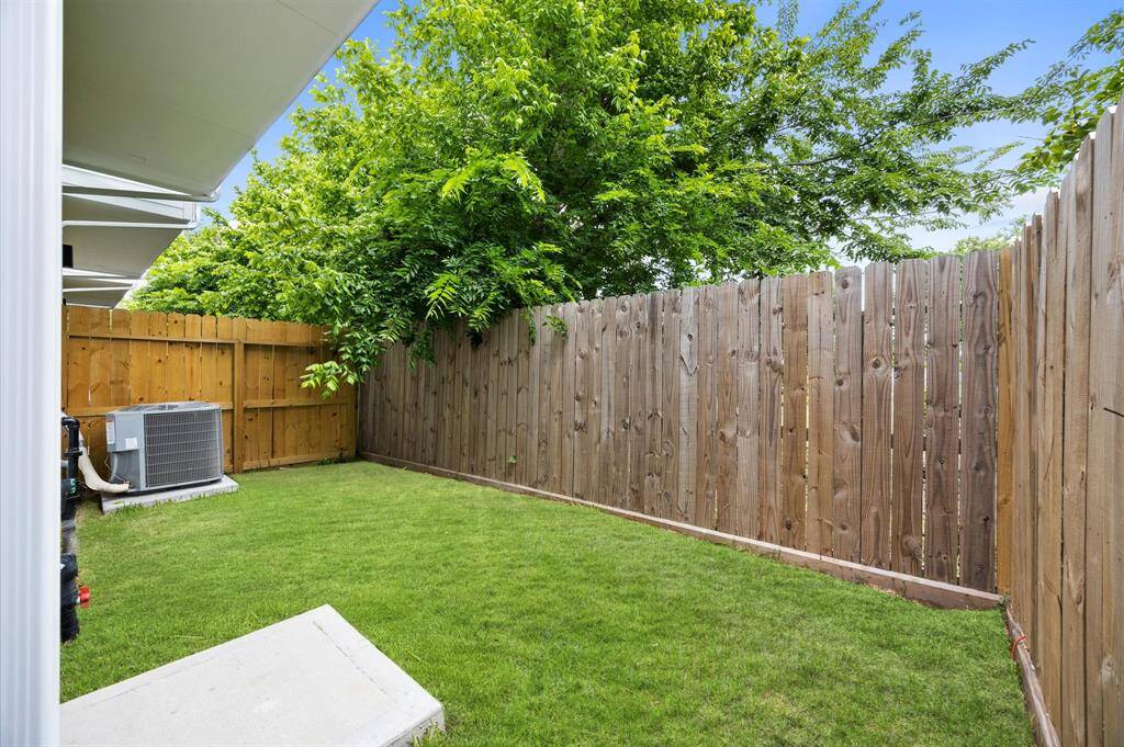 Spacious fenced backyard ideal for entertainment