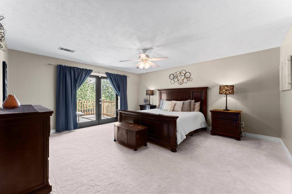 Upstairs you will find your large primary bedroom.