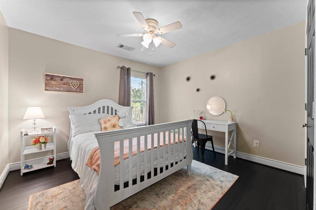 Bedroom 2 has large walk in closet and LVP