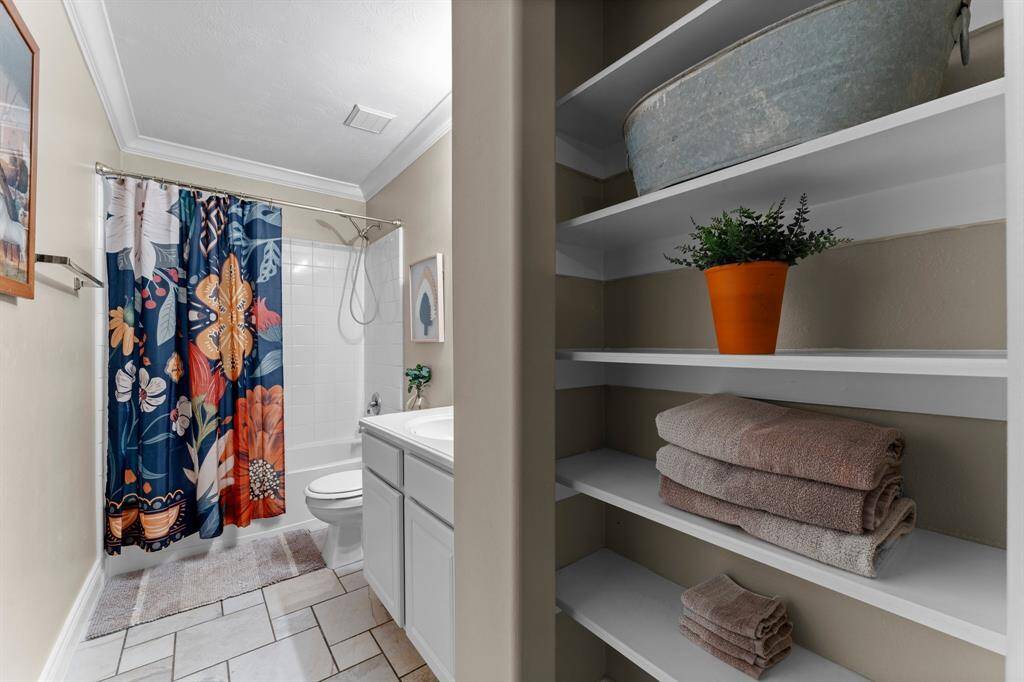 Bathroom 2 with storage space.