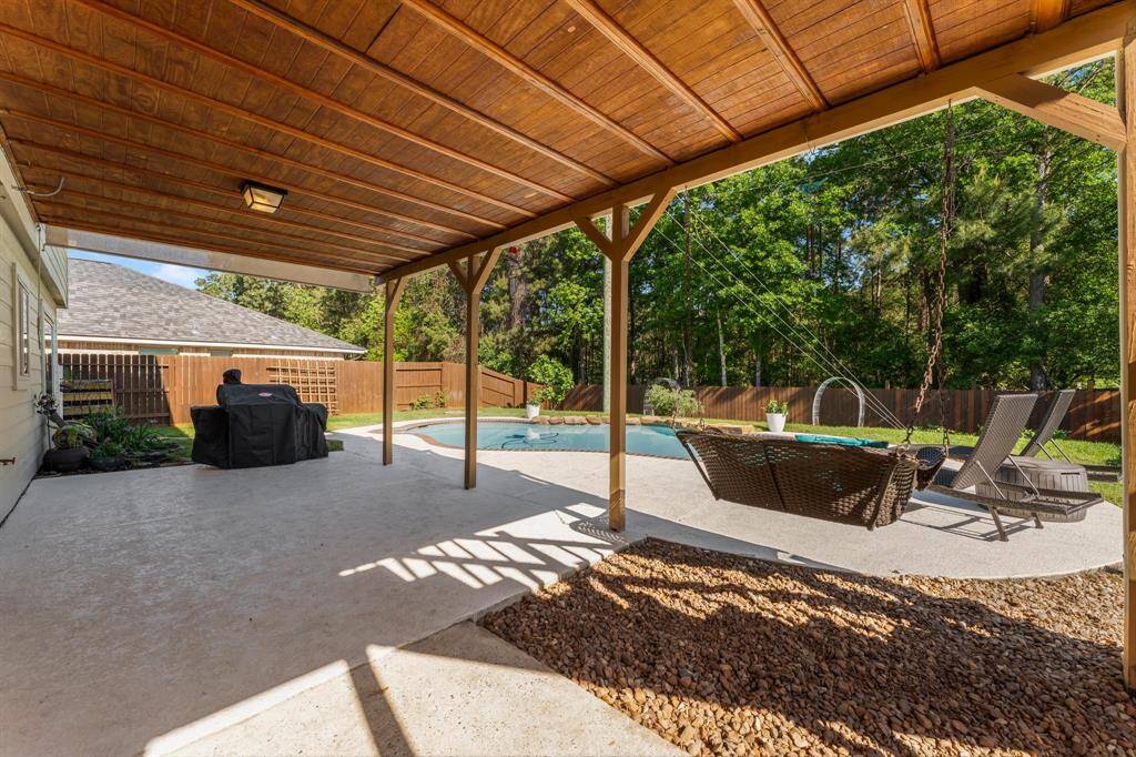 Outside you have the covered back patio.What  a great entertainment space.