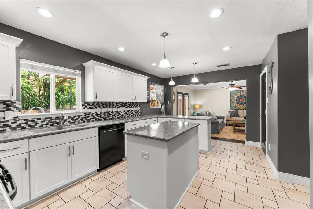 What a great entertaining space open to the family room.