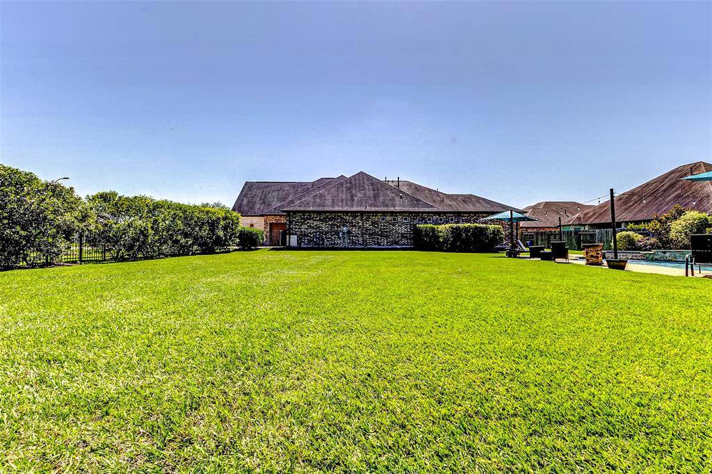 With such a generous amount of space, the possibilities are endless. You could further enhance this backyard oasis by adding a cabana, an outdoor kitchen, a sports court—whatever your heart desires.