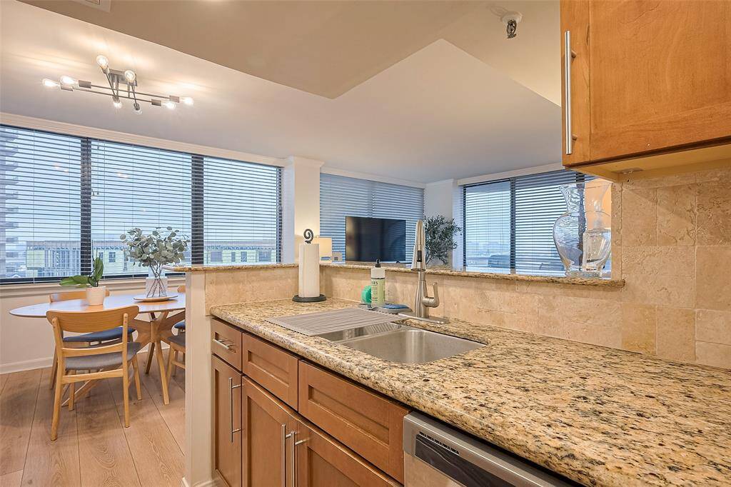 Enjoy a culinary experience like no other—natural light and city views make this kitchen an inspiring place to start or end your day.