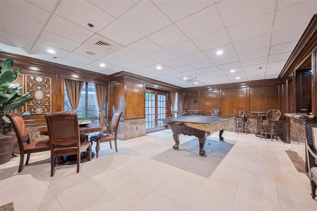 Spacious and inviting, the game room is perfect for casual get-togethers, offering ample seating and a social ambiance.