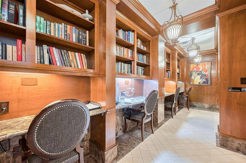 The on-site business center doubles as a quiet library, complete with workstations for focus or productivity.