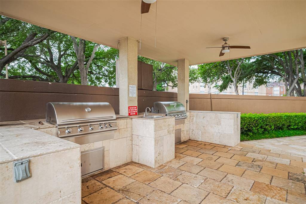Fully equipped grills create an inviting setting for outdoor dining.