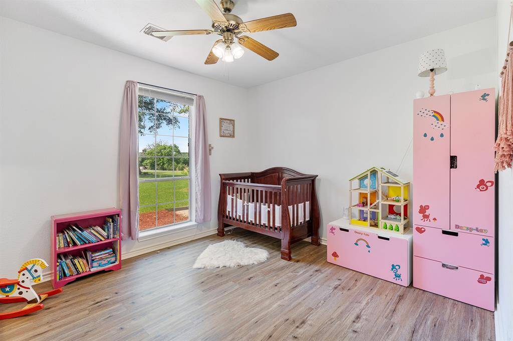 Efficient laundry room with ample closet space.