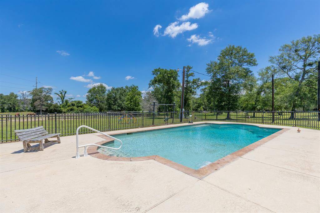 Serene pool oasis perfect for relaxation and entertaining.