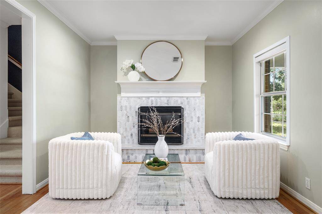 Gas burning fireplace greets you as you enter the home.