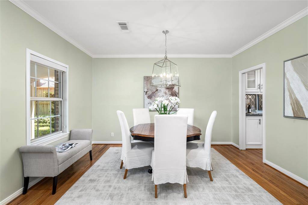 A lovely dining room filled with natural light.
