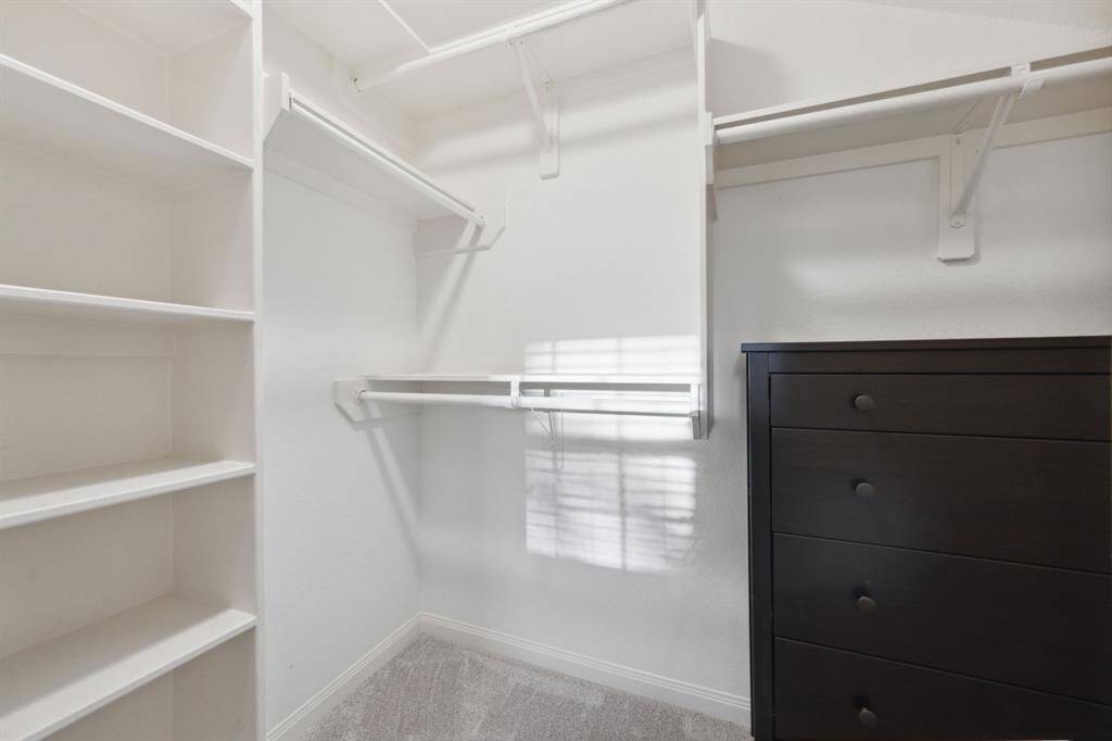 Stay organized with this spacious walk-in closet!