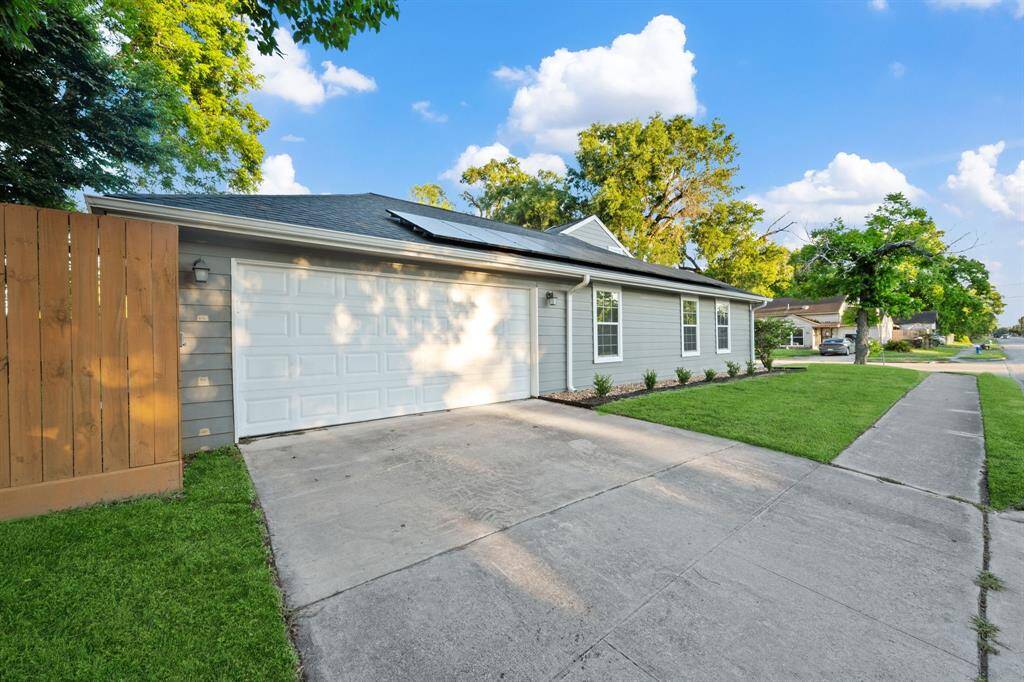 Two-car garage with room for cars, hobbies, or your next man cave masterpiece.
