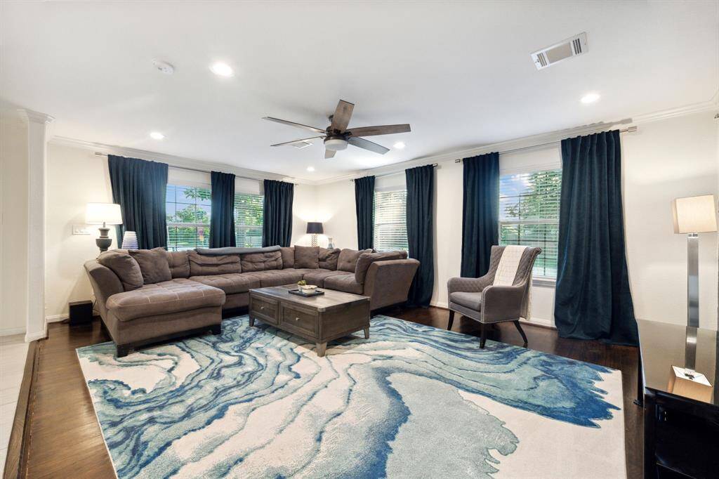 This spacious living area is perfect for movie nights, game days, or sneaky naps when you “accidentally” fall asleep on the couch.