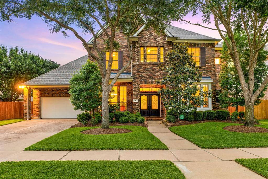 Welcome home to 3811 Bianca Springs Ln, located on a quiet street in the desirable Pine Mill Ranch community and zoned to top-rated Katy ISD. This stunning home offers exceptional curb appeal with a manicured lawn, elegant landscaping, and a charming stone and brick elevation that makes a lasting first impression.