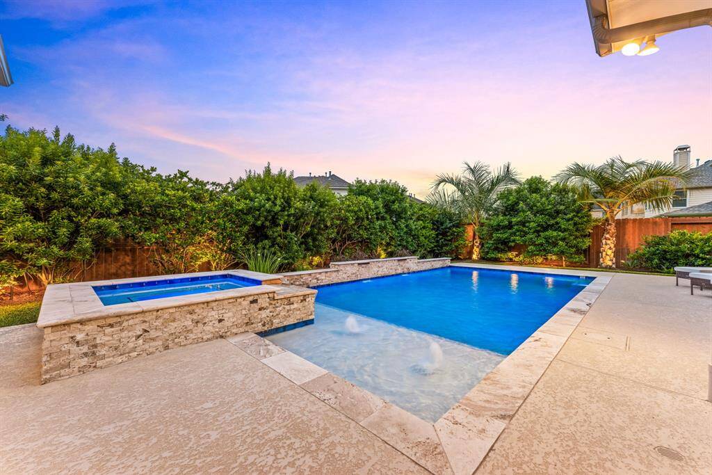 Unwind in your private oasis with a crystal-clear pool and soothing hot tub, surrounded by plenty of space for lounging and outdoor fun.