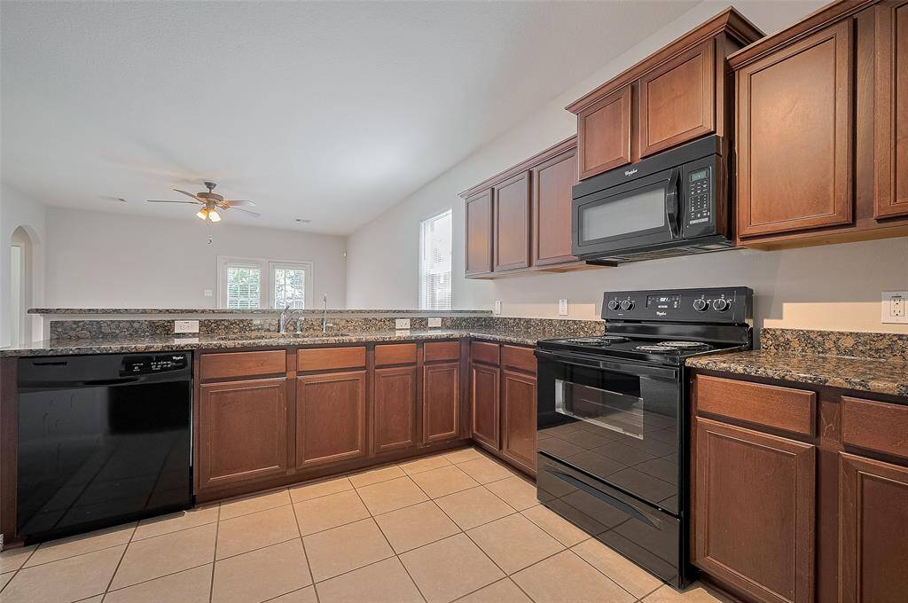 Gas range, microwave and dishwasher.