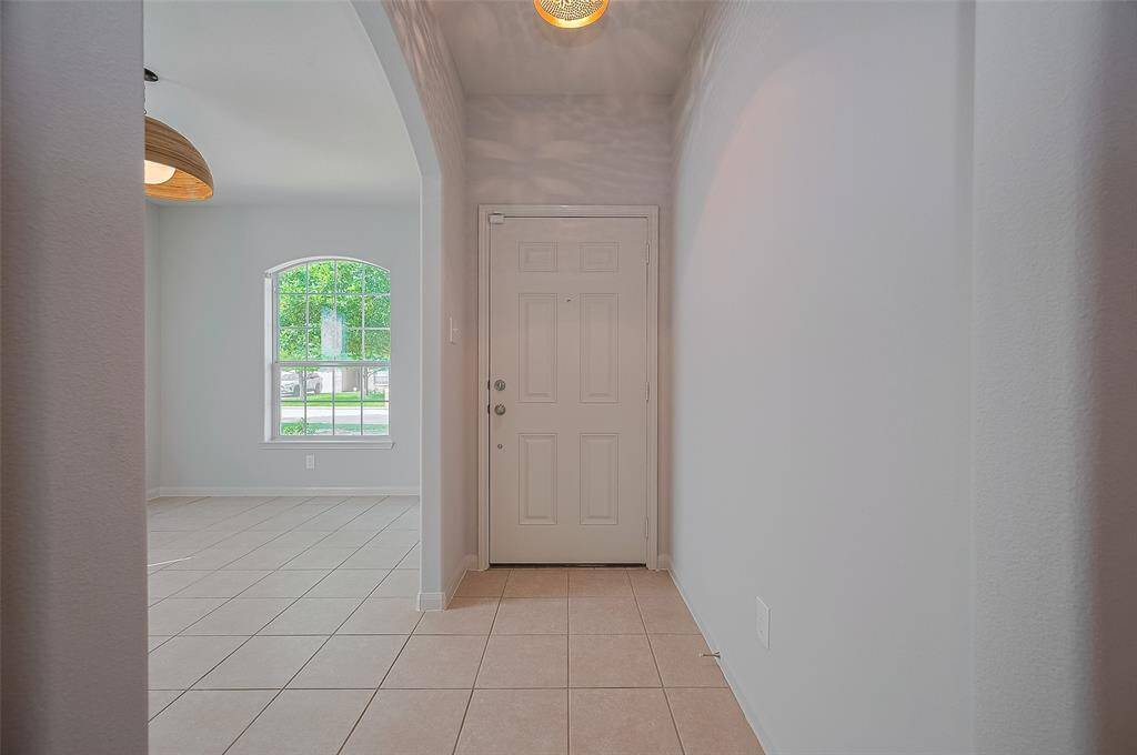 Entrance of the home on the right side you have the formal dining area which can be used as a home office and study as well.