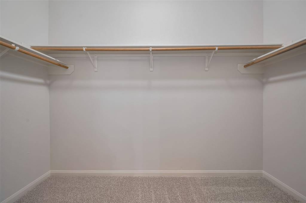 Master bedroom closet in huge.