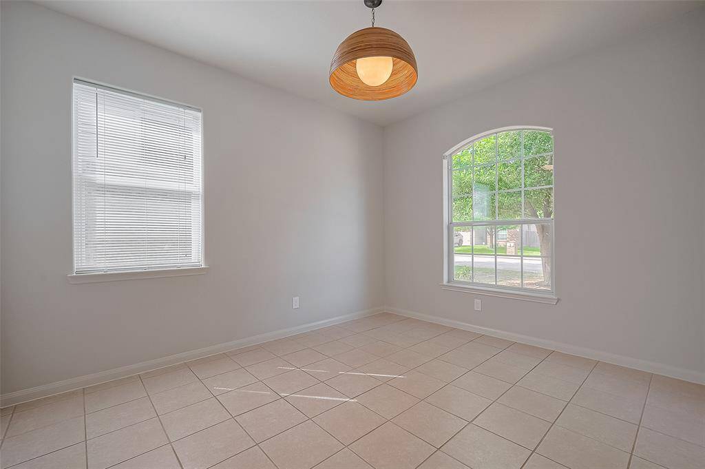 Dining area is big enough for a table of 6 to 8 people with big windows.