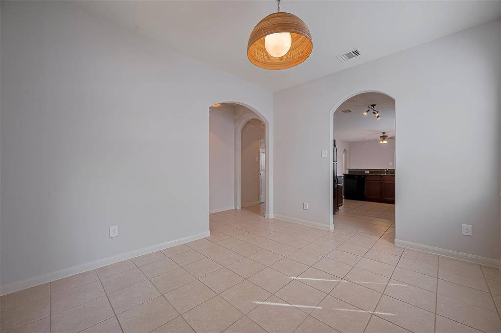Dining area leads to the kitchen.
